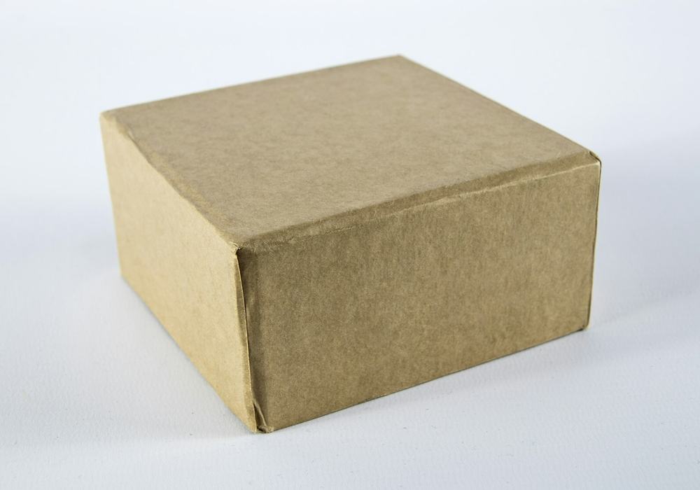 A plain kraft shipping box
